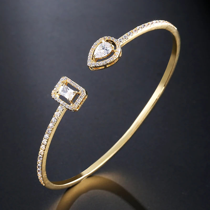 Pulseira Punho Feminina ZAKOL: Cobre, Zircônia Cúbica e Elegância Moderna