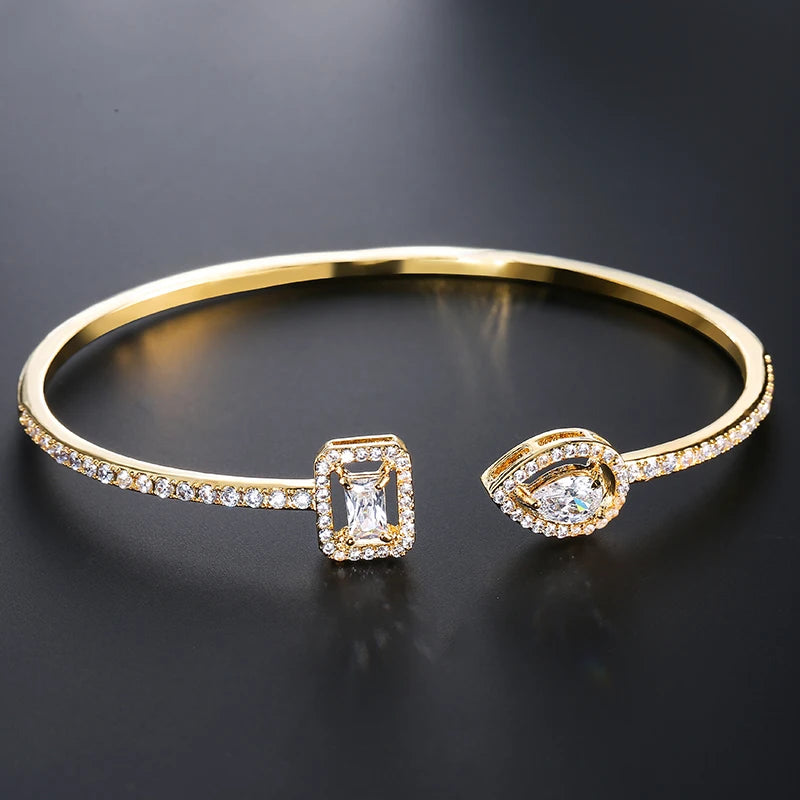 Pulseira Punho Feminina ZAKOL: Cobre, Zircônia Cúbica e Elegância Moderna