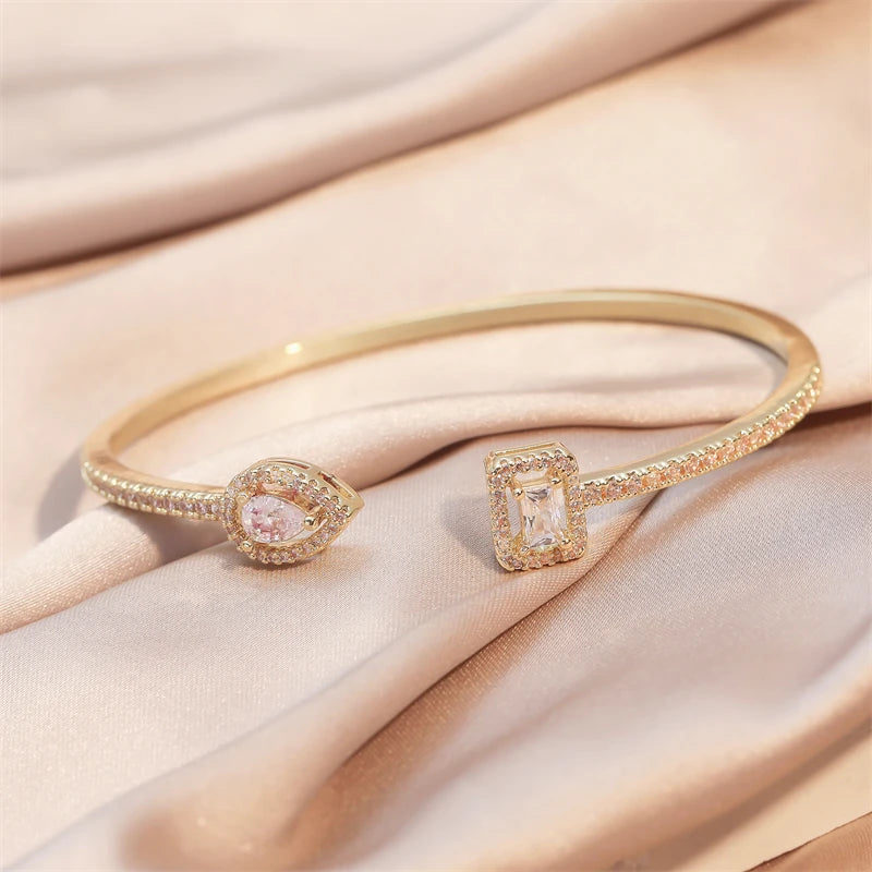 Pulseira Punho Feminina ZAKOL: Cobre, Zircônia Cúbica e Elegância Moderna